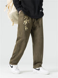 Men's Retro Gold Bamboo Leaf Embroidery Faux Suede Trousers